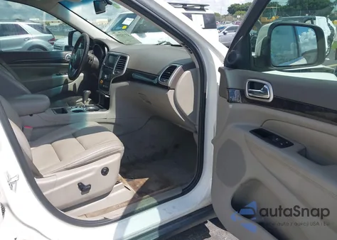 2012 Jeep Grand Cherokee Laredo z USA, uszkodzony, nr VIN 1C4RJEATXCC306944